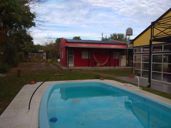 INMOBILIARIA GOMEZ GHISI Y D. FENES NEG INMOB. VENDEN: